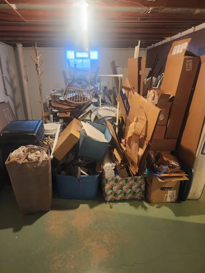 Roll-off dumpster container at job site for 15 Yard Dumpster Rental in Druid Hills